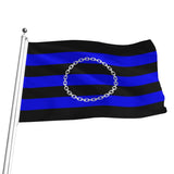 A slave pride flag, a black and blue striped flag with a silver chain-link circle in the center, attached to a silver flagpole on a plain white background.